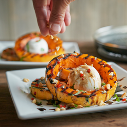 Steam-Grilled Butternut Squash, Burrata, Roasted Hazelnuts and Balsamic Reduction