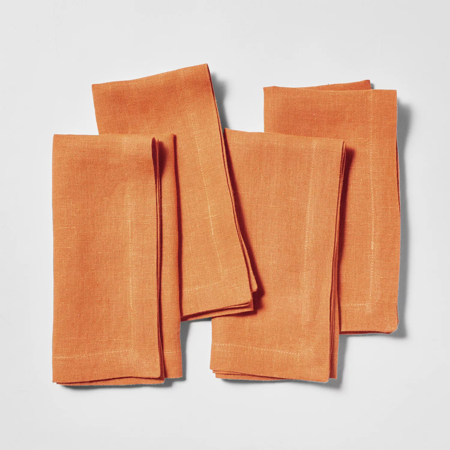 Set of burnt orange washed linen napkins