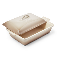 Le Creuset Heritage Covered Baker, 4 qt. Features    Stoneware maintains even temperatures and prevents scorching    Unmatched thermal resistance  safe for freezer, microwave, oven, broiler and dishwasher    Dense stonewa