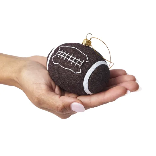 Sur la table Football Ornament