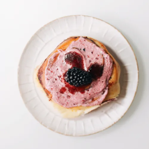 Mixed Berry Cinnamon Rolls with Skyr Frosting