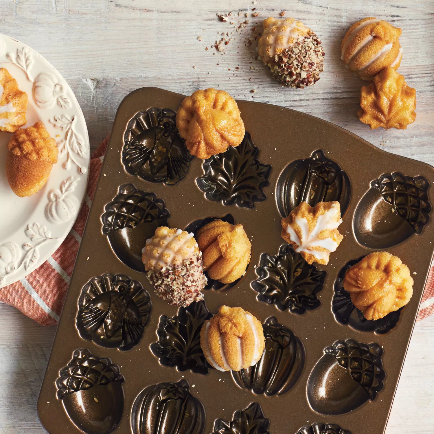 Sur La Table - Add a touch of whimsy to your fall bakes! 🍁🎃🌰 The Nordic  Ware Autumn Delights Cakelet Pan bakes charming pumpkins, acorns and leaves  right into your creations. And