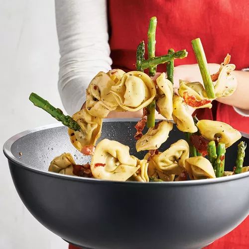 Ricotta and Nettle-Filled Tortellini with Speck and Asparagus