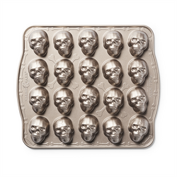 Nordic Ware Skull Bites Cakelet Pan Love the pans however it would have been helpful if they included how you should adjust cooking time