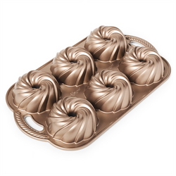 Nordic Ware Swirl Bundtlette Pan Heavy duty and perfectly baked beautiful small bundt cakes