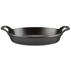 Staub Black Oval Roasting Dish, 1 qt. Warm this piece up in the oven to make it a prime finishing vessel for whatever small food you cook on the stove