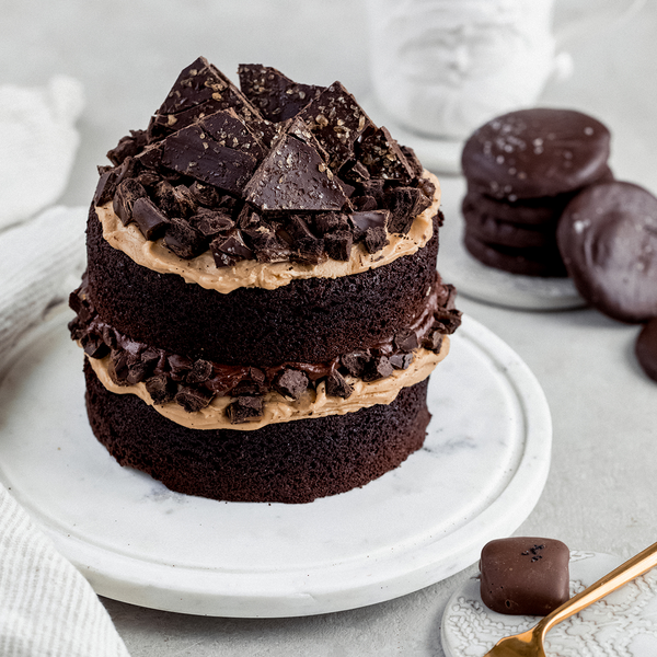 Layered Chocolate Cake with Caramel Frosting and Dark Chocolate Salted Caramel Cookies