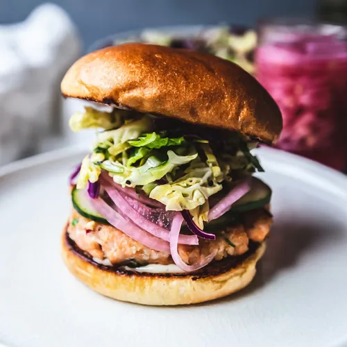 Ginger & Scallion Salmon Burgers with Sesame Slaw