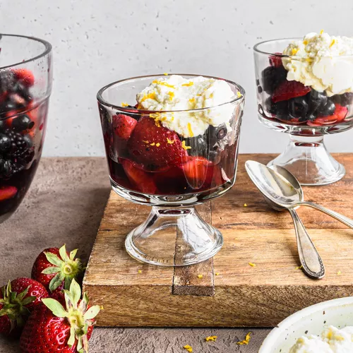 Wine Macerated Berries With Orange Whipped Cream