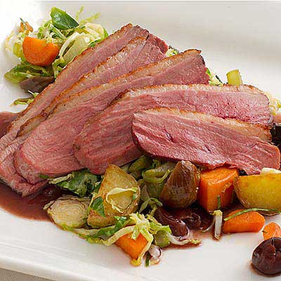 Pan Seared Duck Breast with Two Potato Hash and Dried Cherry Sauce