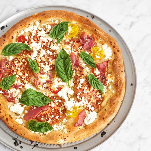 Heirloom Tomato, Prosciutto and Goat Cheese Pizza