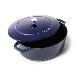 Staub Cast Iron Wide Oval Dutch Oven, 6.25 Qt.  It is gorgeous, durable, and an absolute gem to have as part of my kitchen!