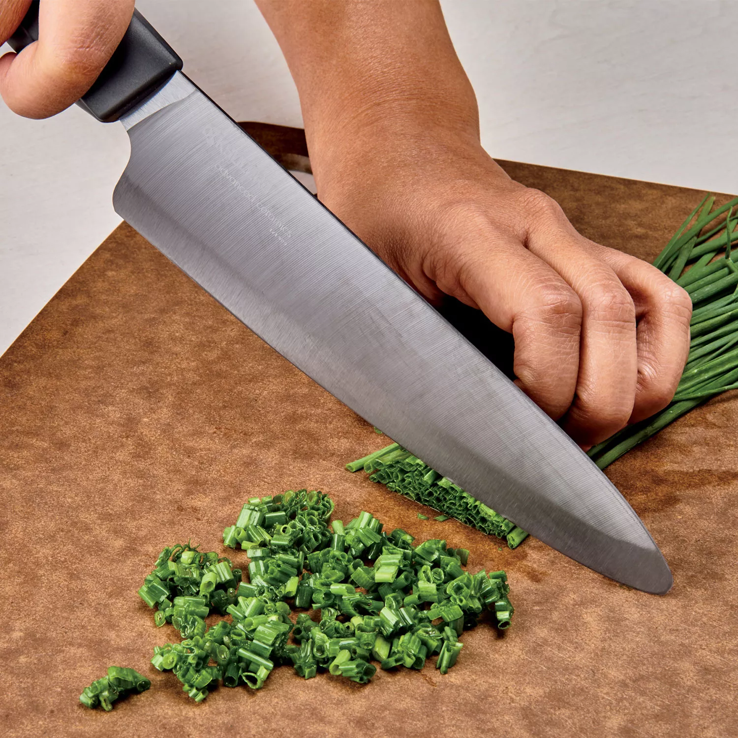 KYOCERA > Kyocera's professional size ultra-sharp lightweight ergonomic  ceramic chefs knife