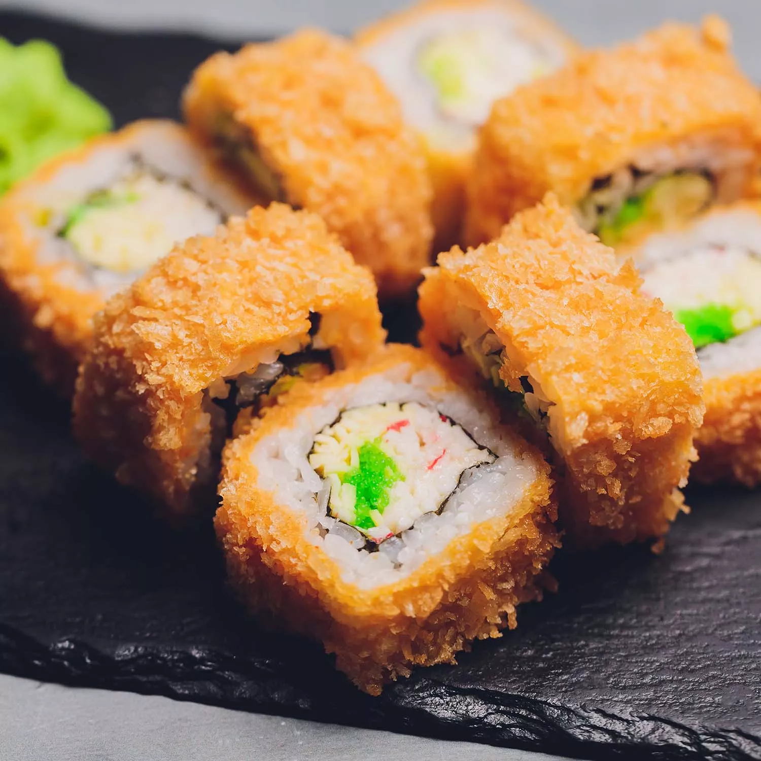 https://assets.surlatable.com/m/365bbe7f14f15a8a/72_dpi_webp-CFA-7779150_Adobe_404390647_Crispy_Rice_Sushi