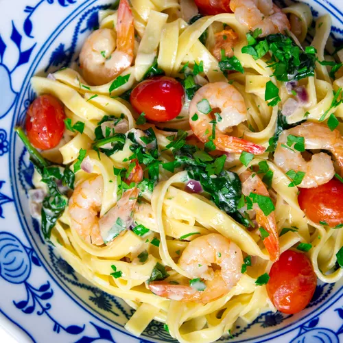 Fresh Tagliatelle With Grilled Shrimp, Lemon, And Burst Cherry Tomatoes