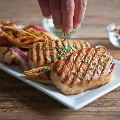Steam-Grilled Pork Chops with Endive, Pecan Nuts and Tarragon
