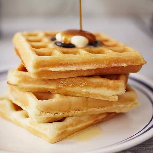 Belgian Waffles with Strawberries and Whipped Cream