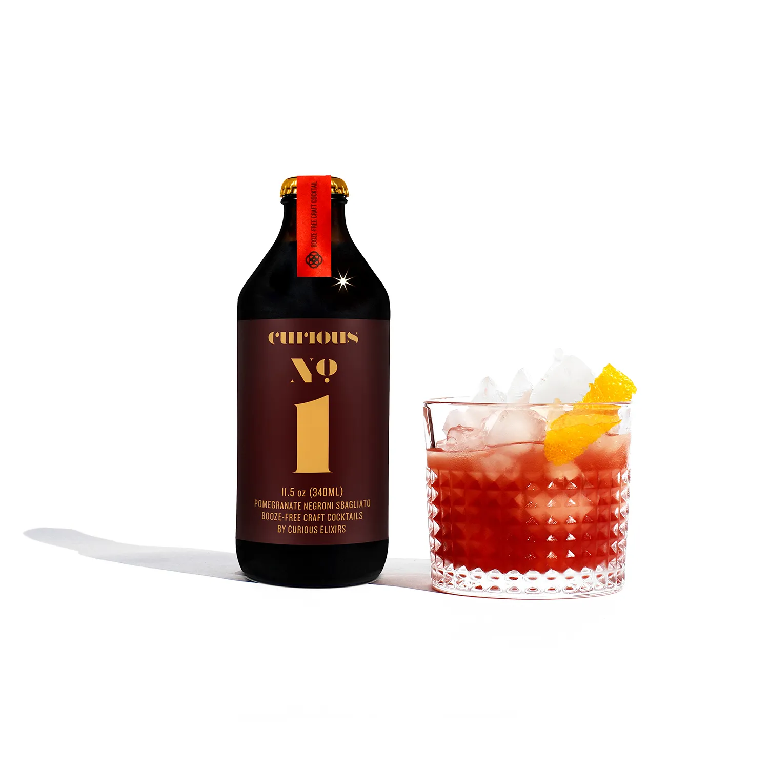 Curious Elixirs No. 1 Booze-Free Pomegranate Negroni Sbagliato