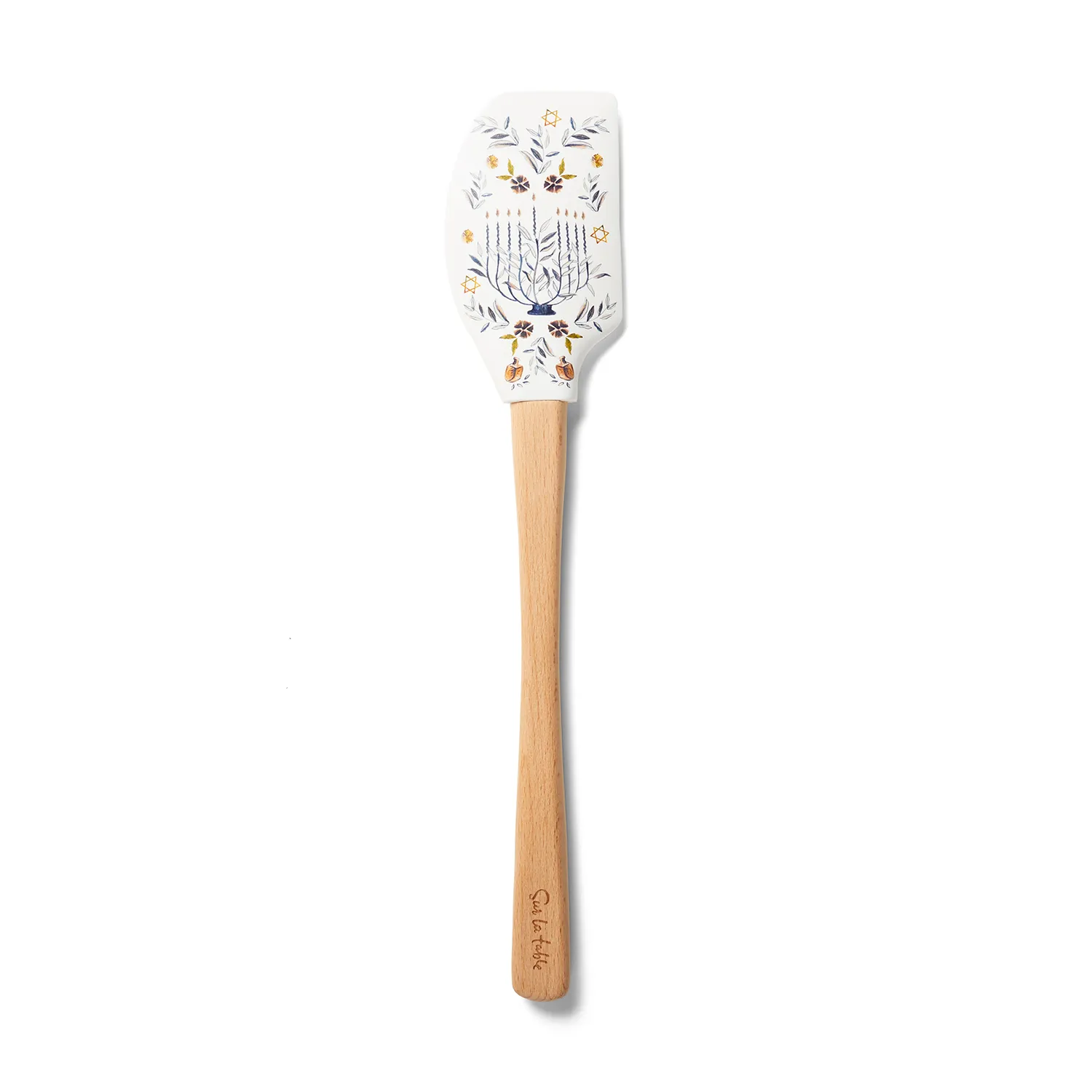 Sur la table Menorah Spatula