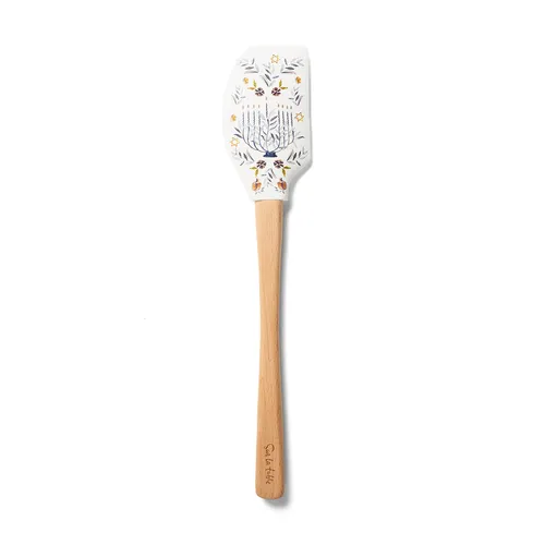 Sur la table Menorah Spatula