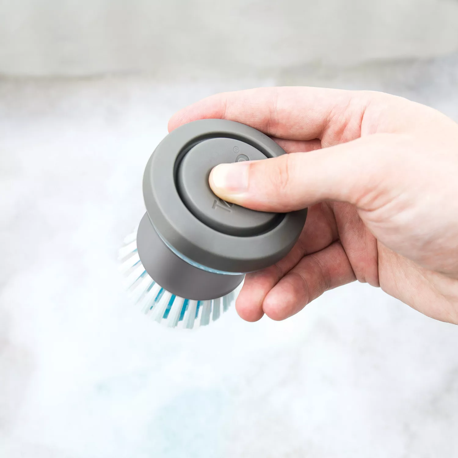 Tovolo Twist N&#8217; Scrub Soap-Dispensing Palm Brush