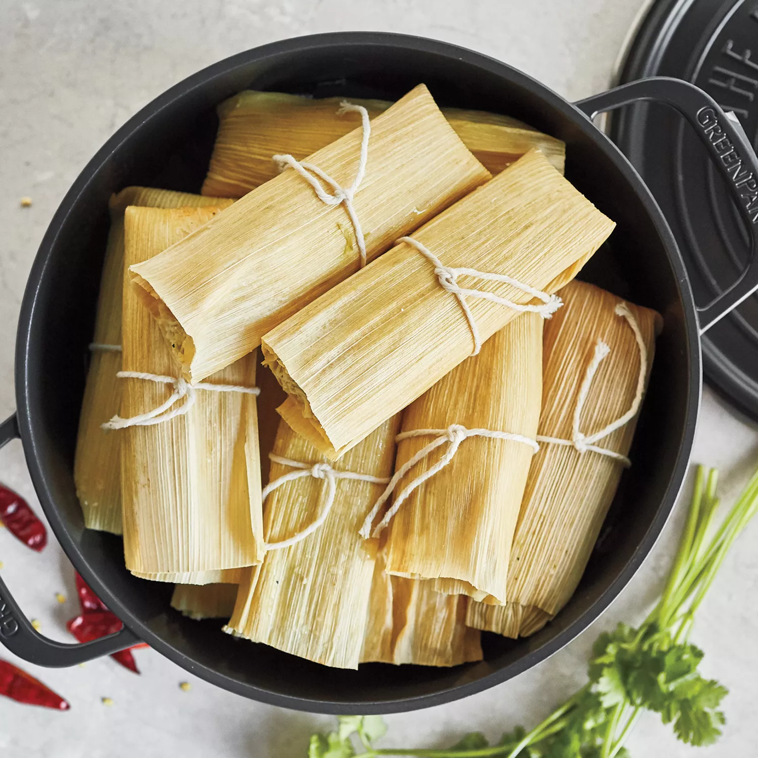 https://assets.surlatable.com/m/581fd76854bef825/72_dpi_webp-CFA-7575012_TamaleMaking