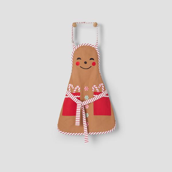 Sur la table Children's Gingerbread Apron