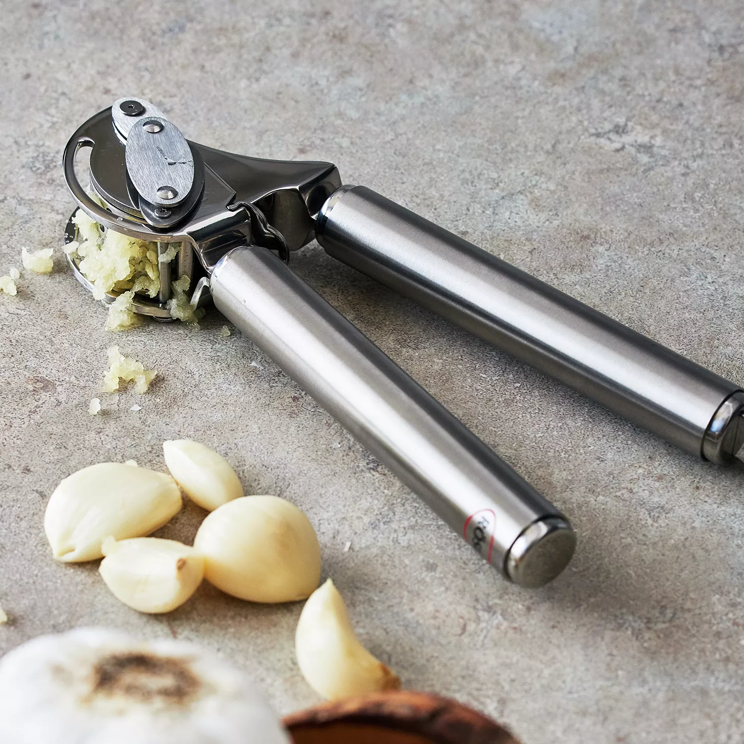 Stainless Steel Rolling Garlic Press - Kind Cooking