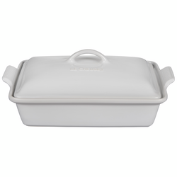 Le Creuset Heritage Covered Baker, 4 qt., White Features    Stoneware maintains even temperatures and prevents scorching    Unmatched thermal resistance  safe for freezer, microwave, oven, broiler and dishwasher    Dense stonewa