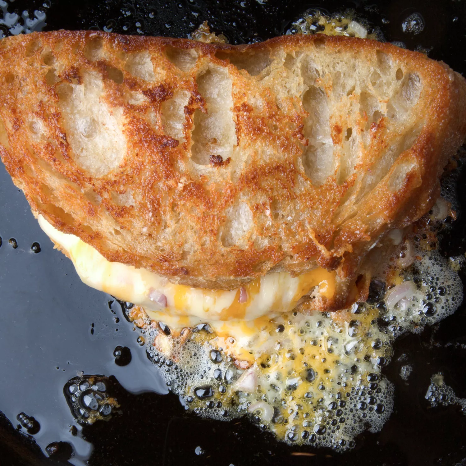 Lodge's Cast Iron Grill Press Will Help You make the Best Grilled Cheese  Ever