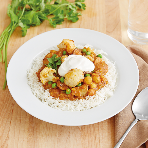 Indian Curry with Potatoes, Cauliflower, Peas and Chickpeas
