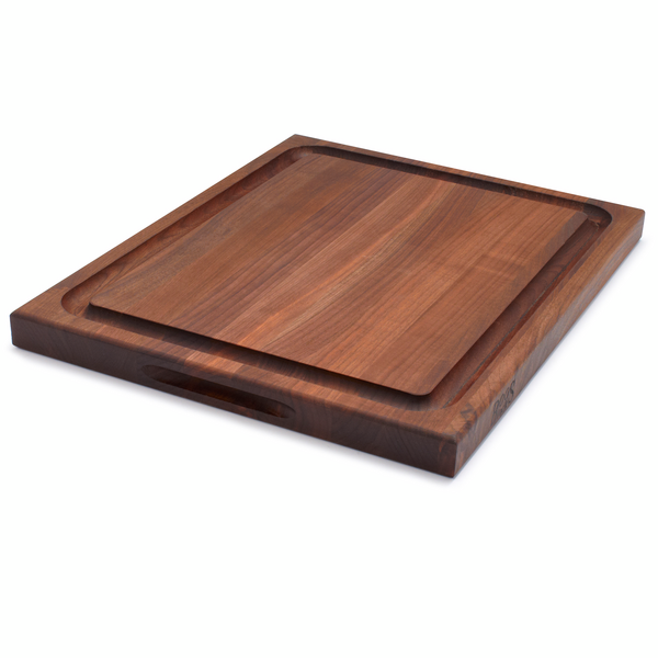 Reversible walnut cutting board
