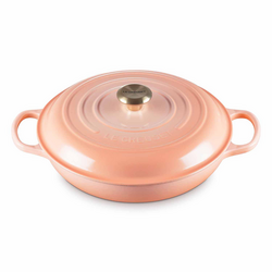 Le Creuset Signature Cast Iron Braiser, 3.5 qt. It is a  beautiful accent in our kitchen