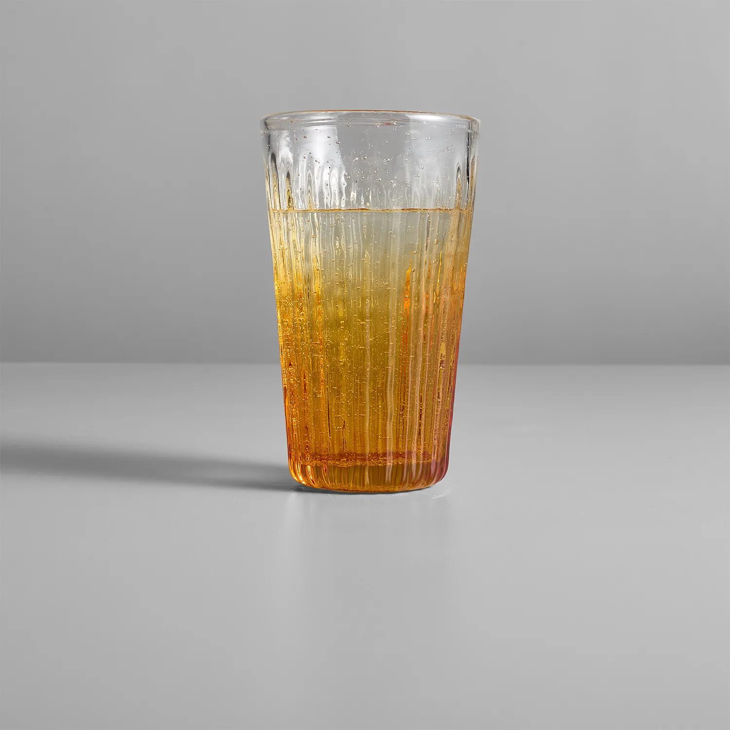 Sur La Table Amber Ribbed Highball Glass
