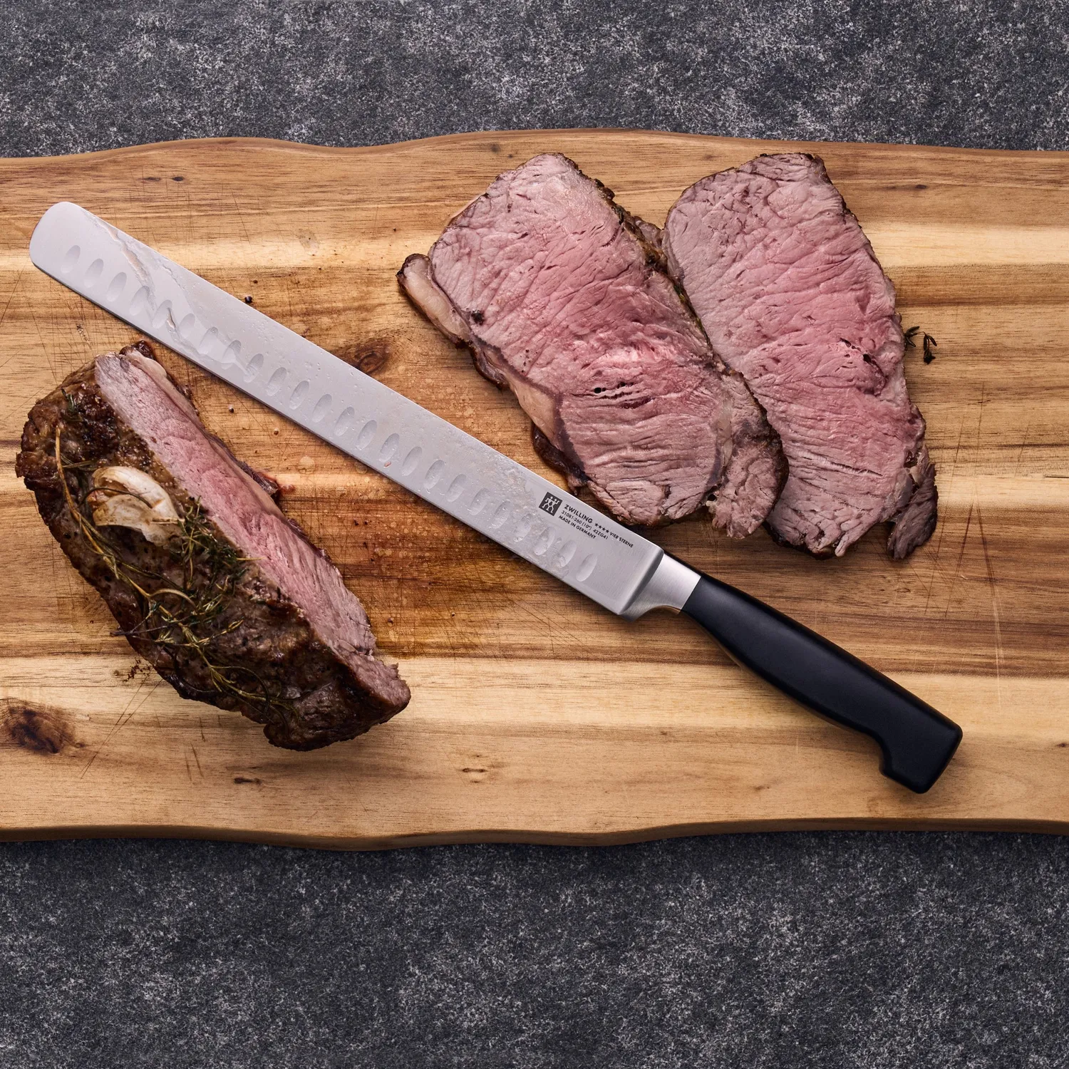 Zwilling J.A. Henckels Four Star Edge Hollow Slicing Edge Knife, 10"